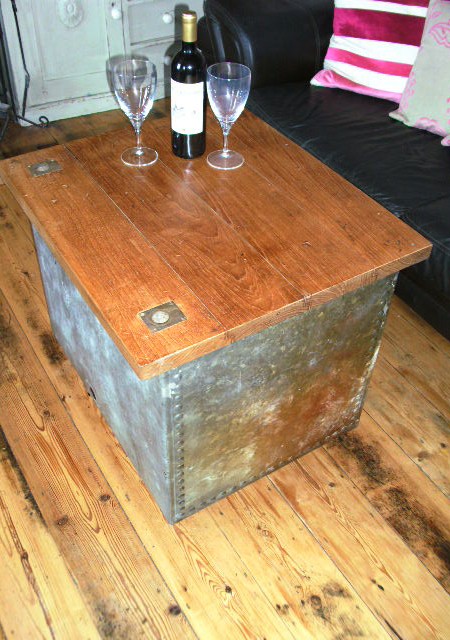 Coffee table from vintage water tank - with storage.