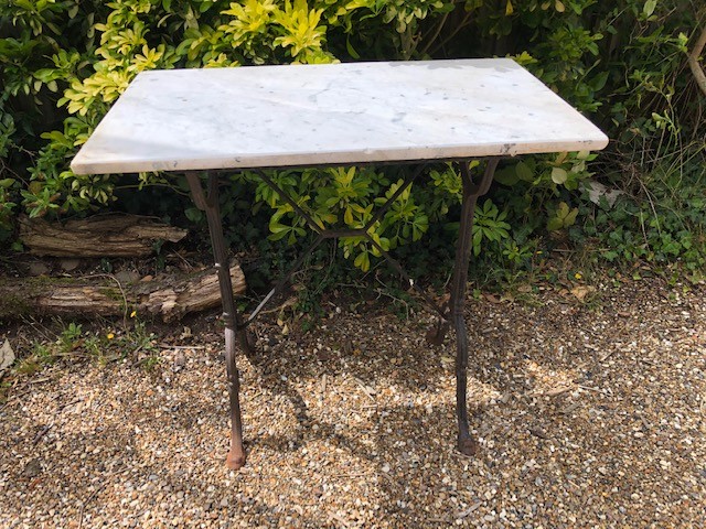 Table - wrought iron base and white marble top
