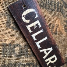 Cellar - hand painted signage on wood