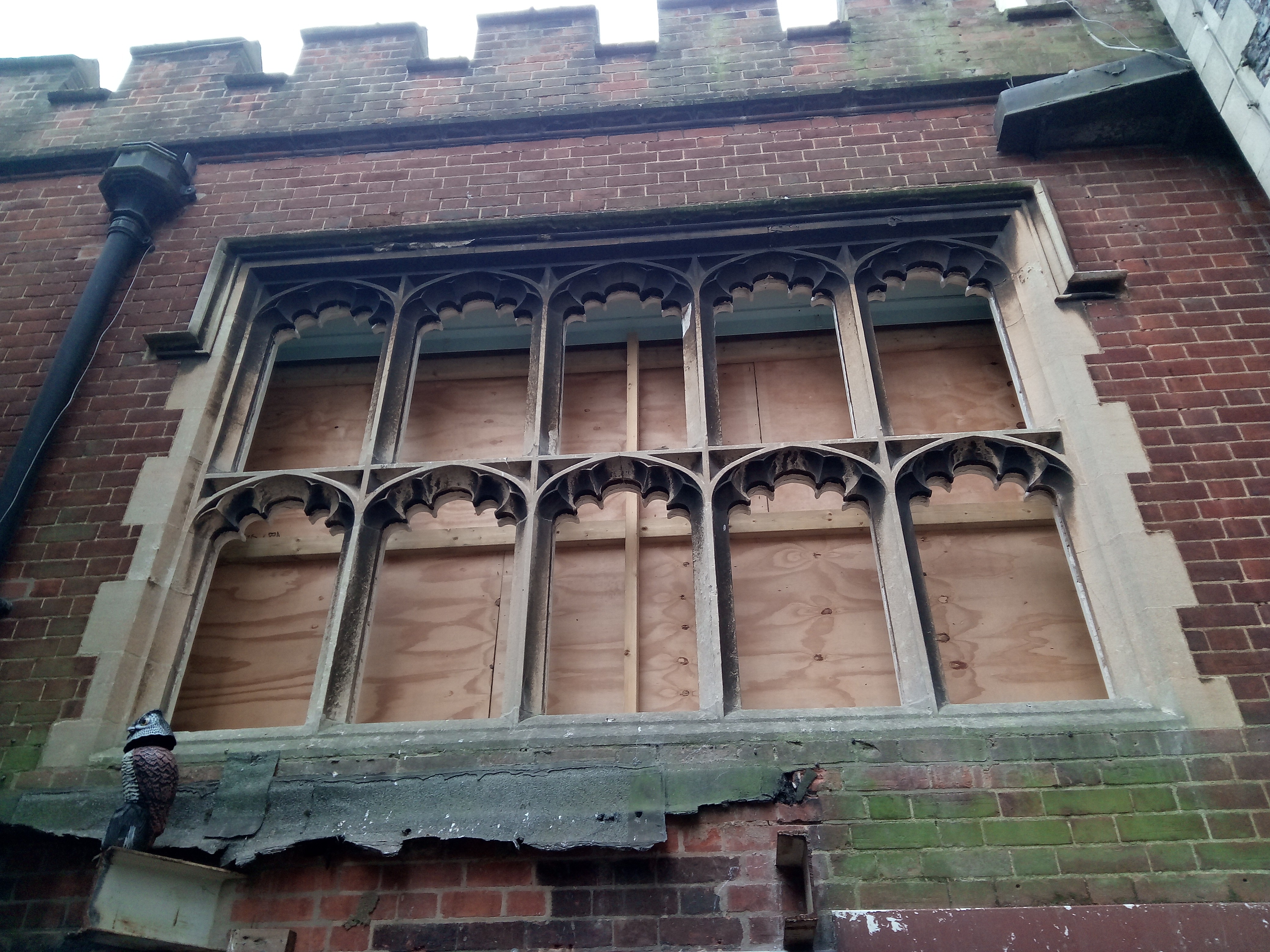 Window , Large stone with some leaded panels.