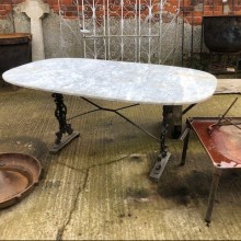 Table - Marble top on iron base.