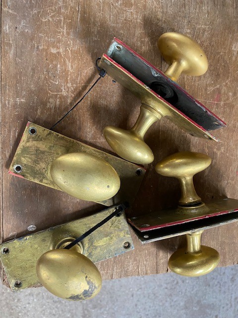 Oval Victorian brass door handles on plates - 4 pairs