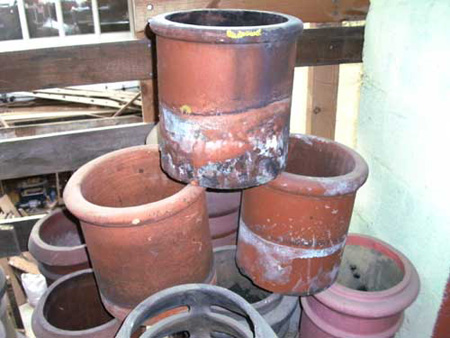 1ft Round red chimney Pots - roll top and cannon top