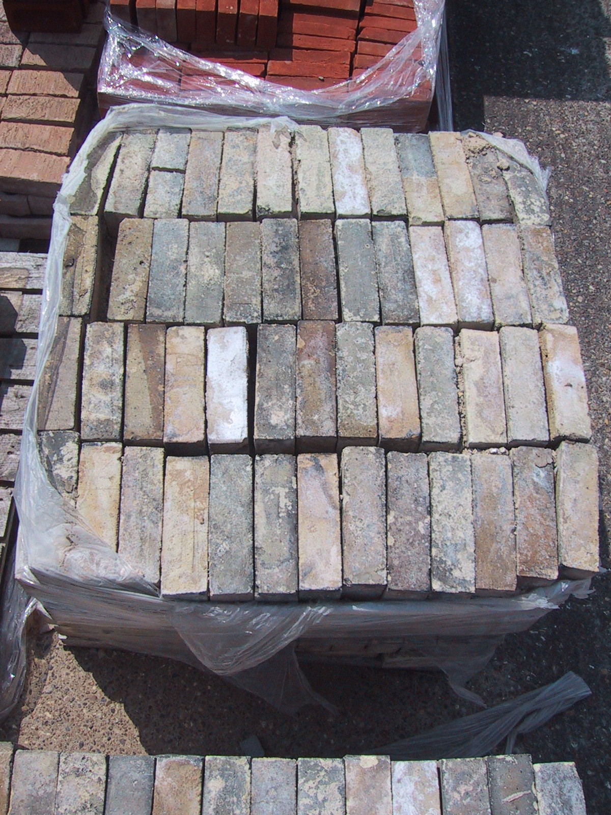 White - Blackened external wall Imperial white bricks