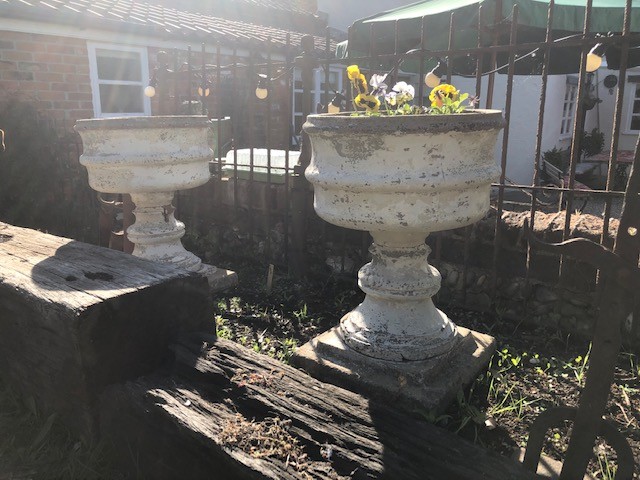 Planters - Pair of vintage concrete urn planters.