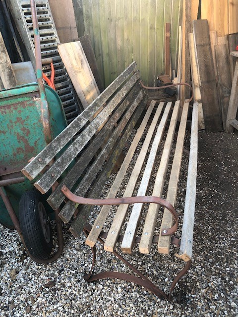 Bench Seat - hardwood and wrought iron garden bench , being renovated.