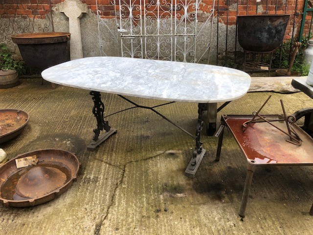 Table - Marble top on iron base.