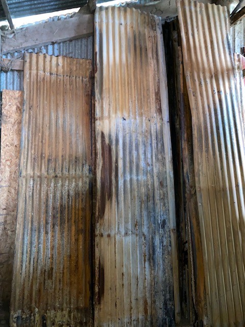 Corrugated tin panelling always in stock - well coloured