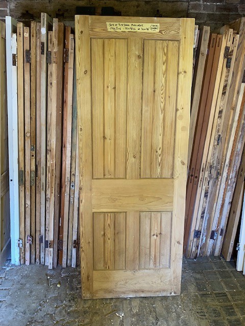Set of 30x78 inch solid pine doors - planked 1 side and 6-panel the other.